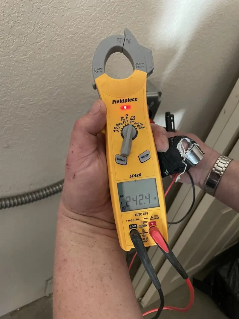 Voltage testing with clamp meter during Circuit Breaker Repair in Cold Spring